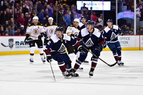 Nov 13, 2016; Denver, CO, USA; Colorado Avalanche left wing Gabriel Landeskog (92) and right wing Mikko Rantanen (96) watch as a empty net goal is scored by Boston Bruins center Dominic Moore (28) (center) in the third period at Pepsi Center. The Bruins defeated the Avalanche 2-0. Mandatory Credit: Ron Chenoy-USA TODAY Sports