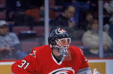 2 Mar 2001: Goal Keeper Tyler Moss #31 of the Carolina Hurricanes is ready on the ice during the game against the New Jersey Devils at the Continental Airlines Arena in East Rutherford, New Jersey. The Devils defeated the Hurricanes 7-3.Mandatory Credit: Jamie Squire /Allsport