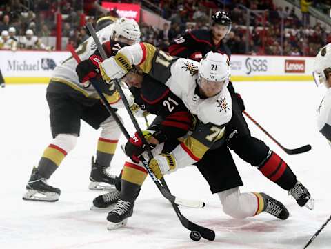 RALEIGH, NC – FEBRUARY 01: Nino Niederreiter #21 of the Carolina Hurricanes battles during a faceoff with William Karlsson #71 of the Vegas Golden Knights during an NHL game on February 1, 2019 at PNC Arena in Raleigh, North Carolina. (Photo by Gregg Forwerck/NHLI via Getty Images)