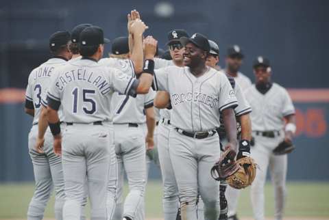 Charlie Hayes of the Colorado Rockies high-fives his teammates during the Major League Baseball National League West game against the San Diego Padres on 8 August 1993 at Jack Murphy Stadium, San Diego, California, United States. The Rockies won the game 5 – 2 (Photo by Stephen Dunn/Allsport/Getty Images)