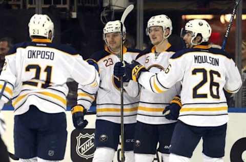 NHL Power Rankings: Buffalo Sabres center Jack Eichel (15) celebrates his goal against the New York Rangers with Buffalo Sabres right wing Kyle Okposo (21) and Buffalo Sabres center Sam Reinhart (23) and Buffalo Sabres left wing Matt Moulson (26) during the third period at Madison Square Garden. Mandatory Credit: Brad Penner-USA TODAY Sports