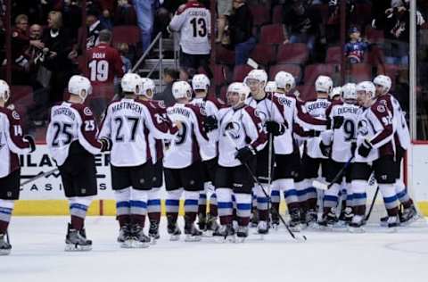 Oct 29, 2016; Glendale, AZ, USA; The Colorado Avalanche celebrate after defeatomg the Arizona Coyotes 3-2 at Gila River Arena. Mandatory Credit: Matt Kartozian-USA TODAY Sports