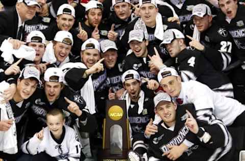 Apr 11, 2015; Boston, MA, USA; Providence College Friars celebrate after defeating the Boston University Terriers 4-3 in the championship game of the Frozen Four college ice hockey tournament at TD Garden. Mandatory Credit: Winslow Townson-USA TODAY Sports