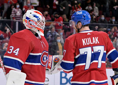 Mar 19, 2022; Montreal, Quebec, CAN; Montreal Canadiens goalie Jake Allen (34) and defenseman Brett Kulak. Mandatory Credit: Eric Bolte-USA TODAY Sports