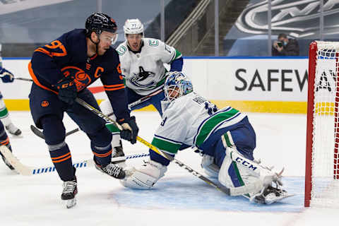 Vancouver Canucks Braden Holtby makes a save. (Photo by Codie McLachlan/Getty Images)