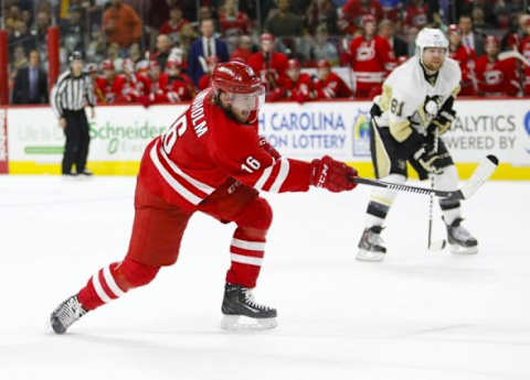 Feb 12, 2016; Raleigh, NC, USA; Carolina Hurricanes forward Elias Lindholm (16) takes a overtime shot against the Pittsburgh Penguins at PNC Arena. The Pittsburgh Penguins defeated the Carolina Hurricanes 2-1 in the shoot out. Mandatory Credit: James Guillory-USA TODAY Sports