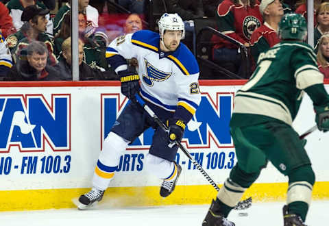 Apr 22, 2015; Saint Paul, MN, USA; St. Louis Blues forward Patrik Berglund (21) carries the puck during the first period in game three of the first round of the 2015 Stanley Cup Playoffs against the Minnesota Wild at Xcel Energy Center. The Blues defeated the Wild 6-1. Mandatory Credit: Brace Hemmelgarn-USA TODAY Sports