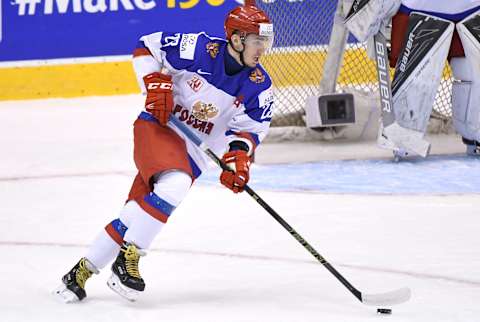 TORONTO, ON – DECEMBER 27: Russia defenceman Yegor Rykov (28) skates the puck up ice against Latvia during the World Junior Hockey Championships on December 27, 2016, at the Air Canada Centre in Toronto, Ontario. (Photo by Dan Hamilton/Icon Sportswire via Getty Images