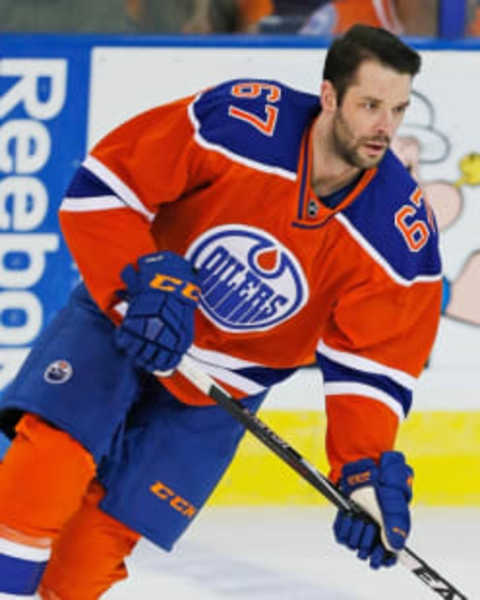 Feb 11, 2016; Edmonton, Alberta, CAN; Edmonton Oilers forward Benoit Pouliot (67) skates against the Toronto Maple Leafs at Rexall Place. Mandatory Credit: Perry Nelson-USA TODAY Sports