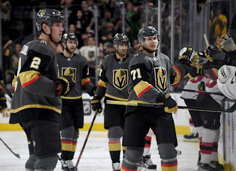 LAS VEGAS, NEVADA – MARCH 03: William Karlsson #71 of the Vegas Golden Knights celebrates with teammates on the bench after scoring a third-period goal, his 100th career NHL goal, against the New Jersey Devils during their game at T-Mobile Arena on March 3, 2020 in Las Vegas, Nevada. The Golden Knights defeated the Devils 3-0. (Photo by Ethan Miller/Getty Images)