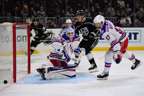 Jan 10, 2022; Los Angeles, California, USA; New York Rangers goaltender Alexandar Georgiev (40) blocks a shot against Los Angeles Kings center Rasmus Kupari (89) during the second period at Crypto.com Arena. Mandatory Credit: Gary A. Vasquez-USA TODAY Sports