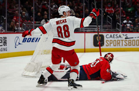 WASHINGTON, DC – MARCH 28: Martin Necas #88 of the Carolina Hurricanes celebrates after scoring a goal against Vitek Vanecek #41 of the Washington Capitals during the first period of the game at Capital One Arena on March 28, 2022, in Washington, DC. (Photo by Scott Taetsch/Getty Images)