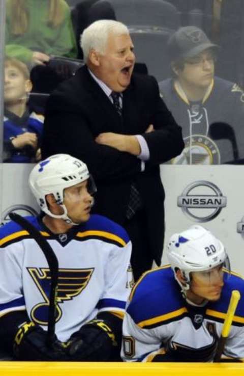 St. Louis Blues head coach Ken Hitchcock coaches from the bench during the third period against the Nashville Predators at Bridgestone Arena. Mandatory Credit: Christopher Hanewinckel-USA TODAY Sports