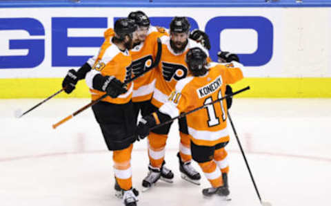 TORONTO, ONTARIO – SEPTEMBER 01: Matt Niskanen #15 of the Philadelphia Flyers is congratulated by his teammates after scoring a goal against the New York Islanders during the third period in Game Five of the Eastern Conference Second Round during the 2020 NHL Stanley Cup Playoffs at Scotiabank Arena on September 01, 2020 in Toronto, Ontario. (Photo by Elsa/Getty Images)