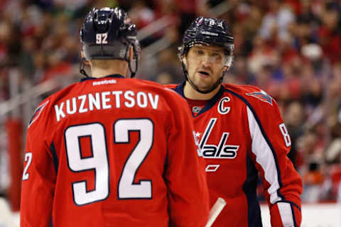 Feb 20, 2016; Washington, DC, USA; Washington Capitals left wing Alex Ovechkin (8) talks to Capitals center Evgeny Kuznetsov (92) against the New Jersey Devils at Verizon Center. Mandatory Credit: Geoff Burke-USA TODAY Sports