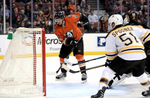 ANAHEIM, CA: Rickard Rakell #67 of the Anaheim Ducks scores a goal as Ryan Spooner #51 of the Boston Bruins looks on during the third period on February 22, 2017. (Photo by Sean M. Haffey/Getty Images)