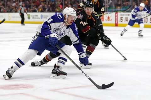 CLEVELAND, OH – APRIL 23: Syracuse Crunch center Carter Verhaeghe (21) as Cleveland Monsters center Ryan MacInnis (72) defends during the third period of the 2019 American Hockey League Calder Cup North Division Semifinals game 3 between the Syracuse Crunch and Cleveland Monsters on April 23, 2019, at Rocket Mortgage FieldHouse in Cleveland, OH. Syracuse defeated Cleveland 2-1. (Photo by Frank Jansky/Icon Sportswire via Getty Images)