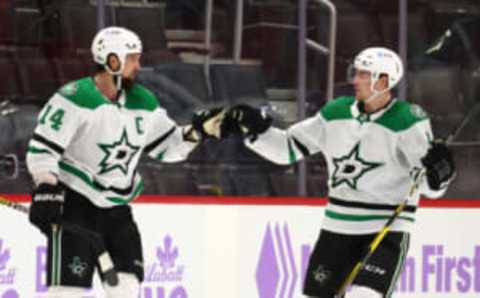 DETROIT, MICHIGAN – APRIL 24: Jamie Benn #14 of the Dallas Stars celebrates his game winning overtime goal with Miro Heiskanen while playing the Detroit Red Wings at Little Caesars Arena on April 24, 2021 in Detroit, Michigan. (Photo by Gregory Shamus/Getty Images)