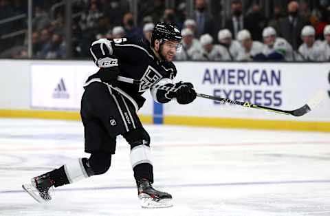 LOS ANGELES, CALIFORNIA – DECEMBER 30: Christian Wolanin, #86 of the Los Angeles Kings, shoots the puck during the second period against the Vancouver Canucks at Crypto.com Arena on December 30, 2021, in Los Angeles, California. (Photo by Katelyn Mulcahy/Getty Images)