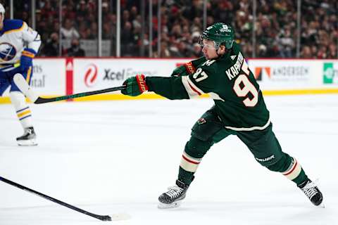 Dec 16, 2021; Saint Paul, Minnesota, USA; Minnesota Wild left wing Kirill Kaprizov (97) shoots the puck to score a goal against the Buffalo Sabres in the second period at Xcel Energy Center. Mandatory Credit: David Berding-USA TODAY Sports