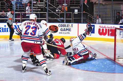 2000 Season: Ranger goaltender Mike Richter does a split to make the save on Florida’s Scott Mellanby. (Photo by John Giamundo/Getty Images)