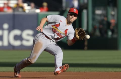 Oct 5, 2022; Pittsburgh, Pennsylvania, USA; St. Louis Cardinals shortstop Tommy Edman (19) fields a ground ball for an out against the Pittsburgh Pirates during the first inning at PNC Park. Mandatory Credit: Charles LeClaire-USA TODAY Sports