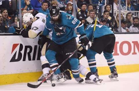 Jun 12, 2016; San Jose, CA, USA; San Jose Sharks defenseman Brent Burns (88) battles for the puck with Pittsburgh Penguins right wing Bryan Rust (17) in the second period in game six of the 2016 Stanley Cup Final at SAP Center at San Jose. Mandatory Credit: Gary A. Vasquez-USA TODAY Sports