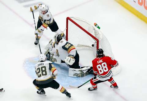 Patrick Kane #88 of the Chicago Blackhawks watches a shot get past Robin Lehner #90 of the Vegas Golden Knights at 4:08 of the first period in Game Four of the Western Conference First Round. (Photo by Jeff Vinnick/Getty Images)