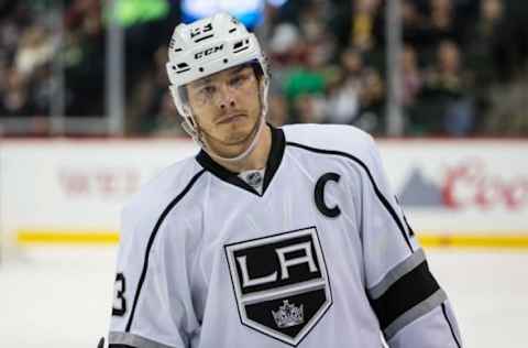 Mar 22, 2016; Saint Paul, MN, USA; Los Angeles Kings forward Dustin Brown (23) between the Los Angeles Kings and Minnesota Wild at Xcel Energy Center. The Wild defeated the Kings 2-1. Mandatory Credit: Brace Hemmelgarn-USA TODAY Sports