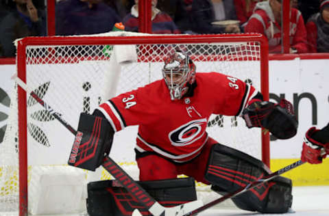 RALEIGH, NC – MARCH 19: Petr Mrazek #34 of the Carolina Hurricanes goes down in the crease to protect the net during an NHL game against the Pittsburgh Penguins on March 19, 2019 at PNC Arena in Raleigh, North Carolina. (Photo by Gregg Forwerck/NHLI via Getty Images)