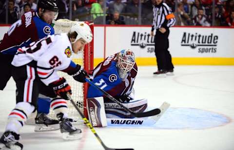 Feb 2, 2016; Denver, CO, USA; Colorado Avalanche goalie Calvin Pickard (31) defends his goal in the third period against the Chicago Blackhawks at the Pepsi Center. The Blackhawks defeated the Avalanche 2-1.Mandatory Credit: Ron Chenoy-USA TODAY Sports