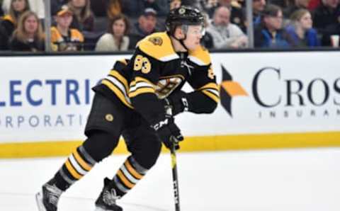 Feb 4, 2020; Boston, Massachusetts, USA; Boston Bruins center Karson Kuhlman (83) skates with the puck during the second period against the Vancouver Canucks at TD Garden. Mandatory Credit: Bob DeChiara-USA TODAY Sports