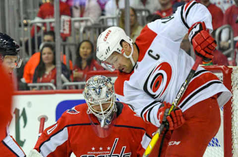 WASHINGTON, DC – APRIL 11: Washington Capitals goaltender Braden Holtby (70) makes a first period save on shot but Carolina Hurricanes center Jordan Staal (11) on April 11, 2019, at the Capital One Arena in Washington, D.C. in the first round of the Stanley Cup Playoffs. (Photo by Mark Goldman/Icon Sportswire via Getty Images)