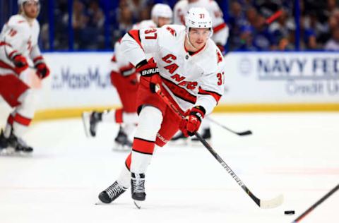 TAMPA, FLORIDA – JUNE 03: Andrei Svechnikov #37 of the Carolina Hurricanes looks to pass during Game Three of the Second Round of the 2021 Stanley Cup Playoffs against the Tampa Bay Lightning at Amalie Arena on June 03, 2021, in Tampa, Florida. (Photo by Mike Ehrmann/Getty Images)