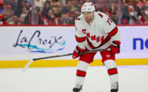 Sep 29, 2023; Sunrise, Florida, USA; Carolina Hurricanes defenseman Tony DeAngelo (77) looks on against the Florida Panthers during the first period at Amerant Bank Arena. Mandatory Credit: Sam Navarro-USA TODAY Sports