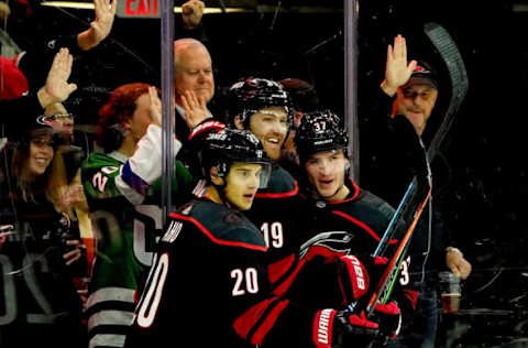 RALEIGH, NC – NOVEMBER 1: Andrei Svechnikov #37 of the Carolina Hurricanes celebrates with teammates Sebastian Aho #20 and Dougie Hamilton #19 after scoring a goal during an NHL game against the Detroit Red Wings on November 1, 2019 at PNC Arena in Raleigh, North Carolina. (Photo by Gregg Forwerck/NHLI via Getty Images)