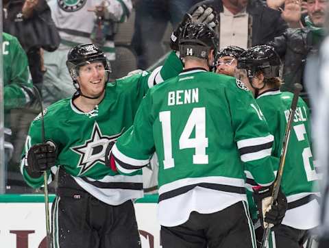 Mar 12, 2016; Dallas, TX, USA; Dallas Stars center Cody Eakin (20) and left wing Jamie Benn (14) and defenseman Kris Russell (2) celebrate Eakin