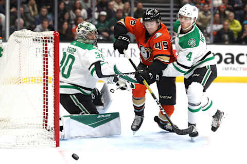 Ben Bishop #30 and Miro Heiskanen #4 of the Dallas Stars defend against Max Jones #49 of the Anaheim Ducks (Photo by Sean M. Haffey/Getty Images)