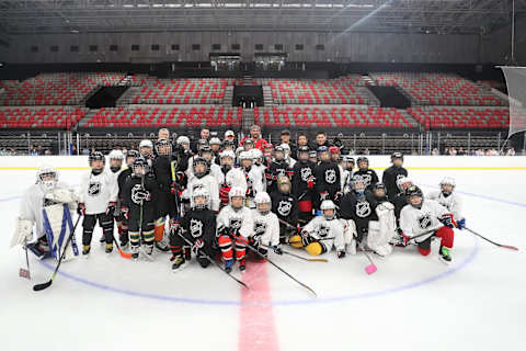 BEIJING, CHINA – AUGUST 05: Alex Ovechkin takes a group photo with children at Shougang Rink on August 05, 2019 in Beijing, China. (Photo by Emmanuel Wong/NHLI via Getty Images)