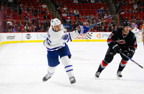 Feb 19, 2017; Raleigh, NC, USA; Toronto Maple Leafs defensemen Roman Polak (46) takes a shot against the Carolina Hurricanes at PNC Arena. The Toronto Maple Leafs defeat the Carolina Hurricanes 4-0. Mandatory Credit: James Guillory-USA TODAY Sports