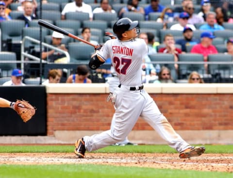 Jul 4, 2016; New York City, NY, USA; Miami Marlins rightfielder Giancarlo Stanton (27) bats against the New York Mets at Citi Field. Mandatory Credit: Andy Marlin-USA TODAY Sports