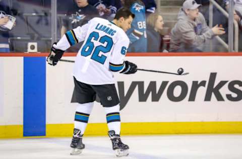 WINNIPEG, MB – FEBRUARY 5: Kevin Labanc #62 of the San Jose Sharks takes part in the pre-game warm up prior to NHL action against the Winnipeg Jets at the Bell MTS Place on February 5, 2019 in Winnipeg, Manitoba, Canada. (Photo by Darcy Finley/NHLI via Getty Images)