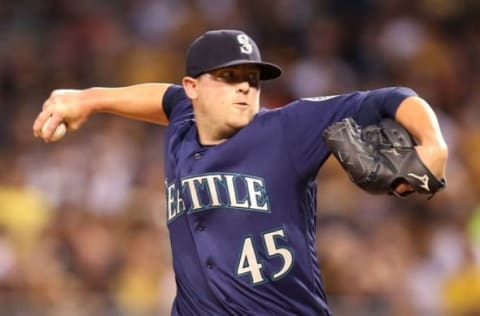 Jul 27, 2016; Pittsburgh, PA, USA; Seattle Mariners relief pitcher Drew Storen (45) pitches against the Pittsburgh Pirates during the seventh inning in an inter-league game at PNC Park. The Pirates won 10-1. Mandatory Credit: Charles LeClaire-USA TODAY Sports