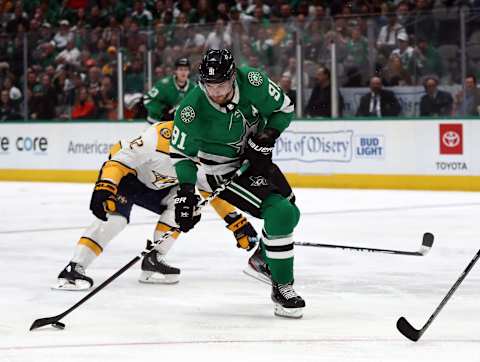 DALLAS, TEXAS – MARCH 07: Tyler Seguin #91 of the Dallas Stars skates the puck against the Nashville Predators in the third period at American Airlines Center on March 07, 2020 in Dallas, Texas. (Photo by Ronald Martinez/Getty Images)