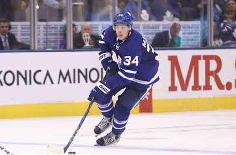 Oct 2, 2016; Toronto, Ontario, CAN; Toronto Maple Leafs center Auston Matthews (34) skates with the puck against the Montreal Canadiens during a preseason hockey game at Air Canada Centre. Mandatory Credit: Tom Szczerbowski-USA TODAY Sports