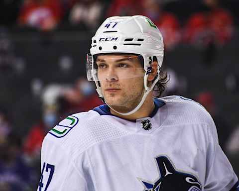 Noah Juulsen on the ice for the Canucks in an overtime loss to the Flames. (Photo by Derek Leung/Getty Images)