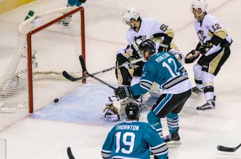 Dec 1, 2015; San Jose, CA, USA; San Jose Sharks center Patrick Marleau (12) scores against the San Jose Sharks in the second period at SAP Center at San Jose. Mandatory Credit: John Hefti-USA TODAY Sports.