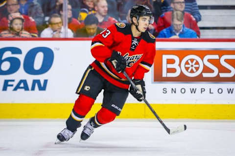 Jan 27, 2016; Calgary, Alberta, CAN; Calgary Flames left wing Johnny Gaudreau (13) skates against the Nashville Predators during the first period at Scotiabank Saddledome. Nashville Predators won 2-1. Mandatory Credit: Sergei Belski-USA TODAY Sports