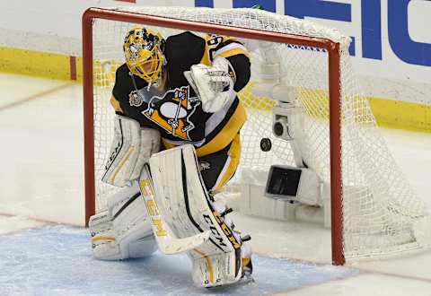 May 13, 2017; Pittsburgh, PA, USA; Pittsburgh Penguins goalie Marc-Andre Fleury (29) makes a save against the Ottawa Senators during the second period in game one of the Eastern Conference Final of the 2017 Stanley Cup Playoffs at PPG PAINTS Arena. Mandatory Credit: Don Wright-USA TODAY Sports