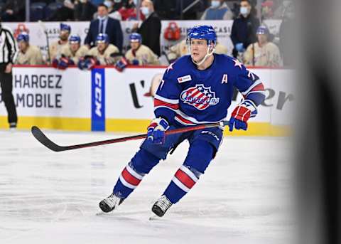 LAVAL, QC – APRIL 08: Ethan Prow #7 of the Rochester Americans skates against the Laval Rocket during the second period at Place Bell on April 8, 2022 in Laval, Canada. The Laval Rocket defeated the Rochester Americans 4-3 in overtime. (Photo by Minas Panagiotakis/Getty Images)